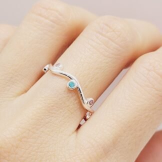 ANILLO COLEC RAMO TORCIDO 8 CIRCONIAS