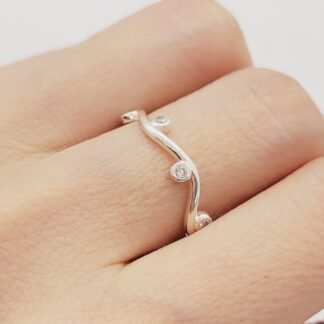 ANILLO COLEC RAMO TORCIDO 8 CIRCONIAS