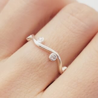 ANILLO COLEC RAMO TORCIDO 8 CIRCONIAS